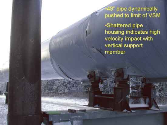 48" pipe dynamically pushed to the limit of VSM; shattered pipe housing indicates high velocity impact with vertical support member.