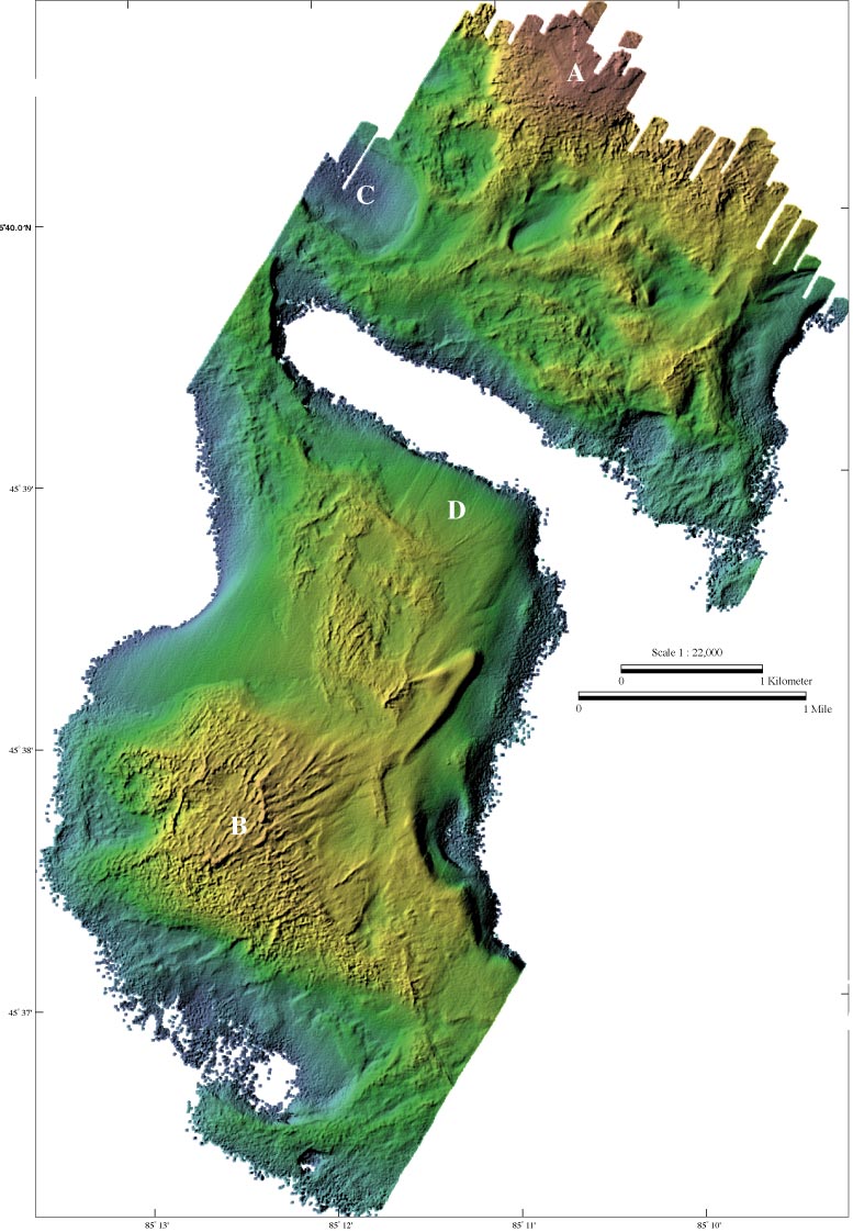 Color coded shaded relief bathymetry, see caption below.