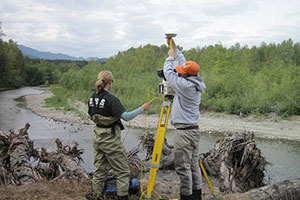 Photograph of Amy with Josh Logan, working on the Elwha River.