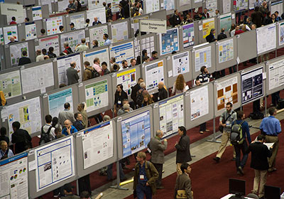 Photograph looking down upon the poster sessions from the 2011 AGU meeting, courtesy of NASA.