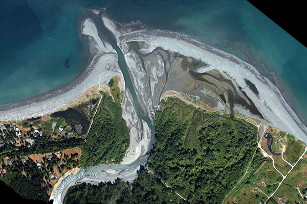 Aerial photograph compiled from 496 images collected from cameras mounted on an airplane, of the mouth of the Elwha River in Washington.