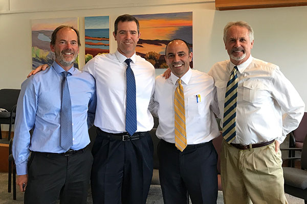 Photograph of Charles Lester, Patrick Barnard, Congressman Jimmy Panetta, and Gary Griggs.