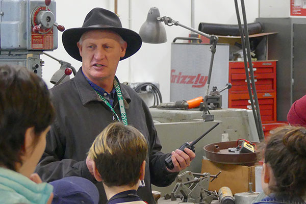Rob Wyland guides students through the USGS Marine Facility, where engineers and technicians design, fabricate, and maintain equipment for field research.