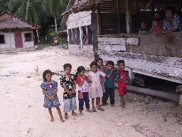 Photo of children on beach after tsunami.