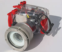 hand-held digital still camera used on beaches and underwater by divers