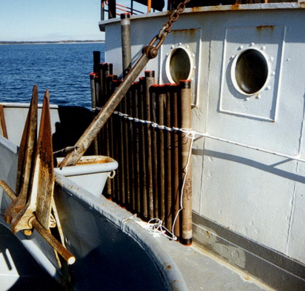 Cores (in plastic liners) stored on the forward deck after being labeled, cut into sections and capped.