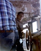 "Red" Banker (right) at the helm of the RV UCONN during cruise UCONN84-1).