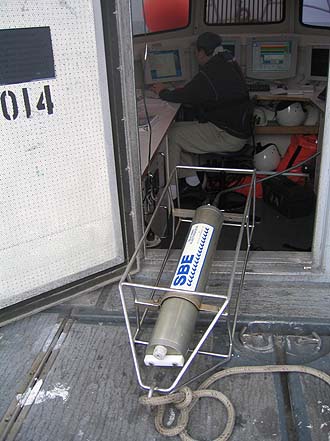 Figure 14. CTD profiler shown on the deck of the NOAA ship THOMAS JEFFERSON. Data derived from frequent deployments of this device were used to perform sound velocity corrections on the multibeam data.